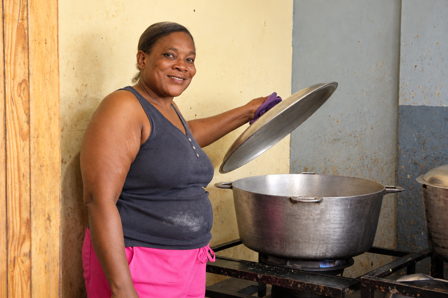 Smiling Cook with a Steaming Stockpot.png