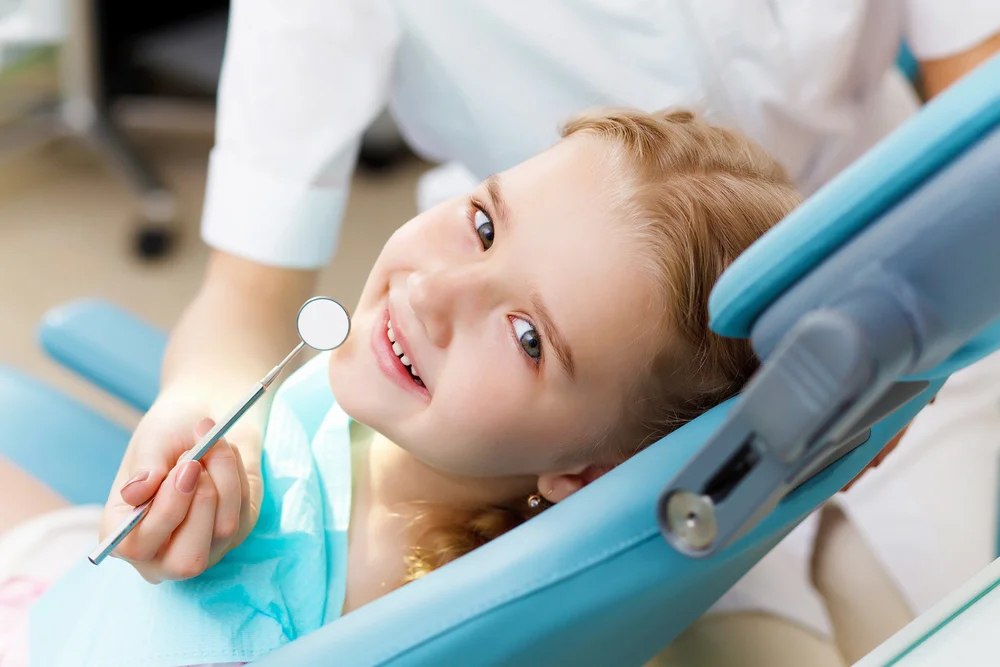 Child receiving dental care