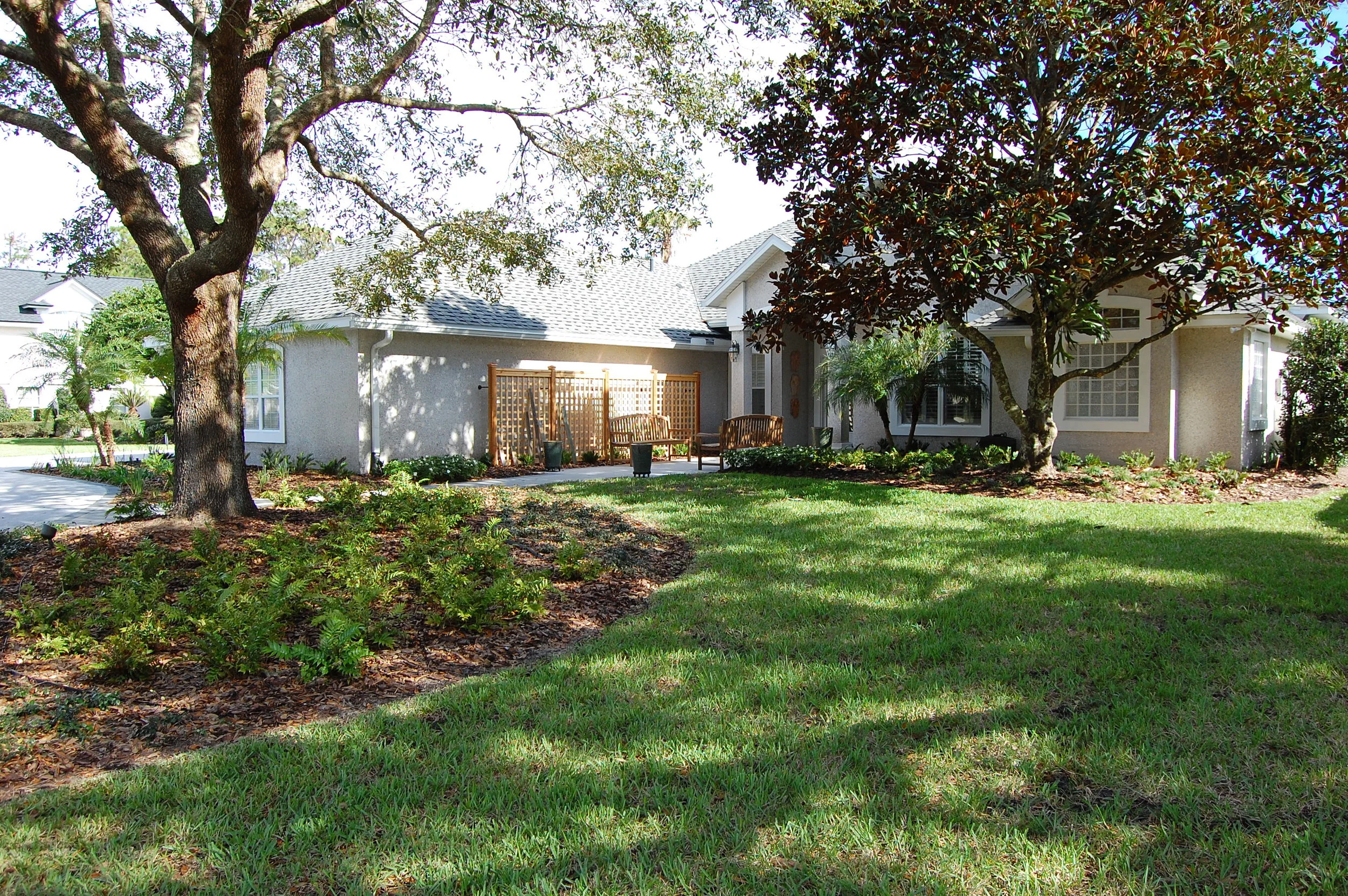  New front yard and entry area with seating and trellis. 