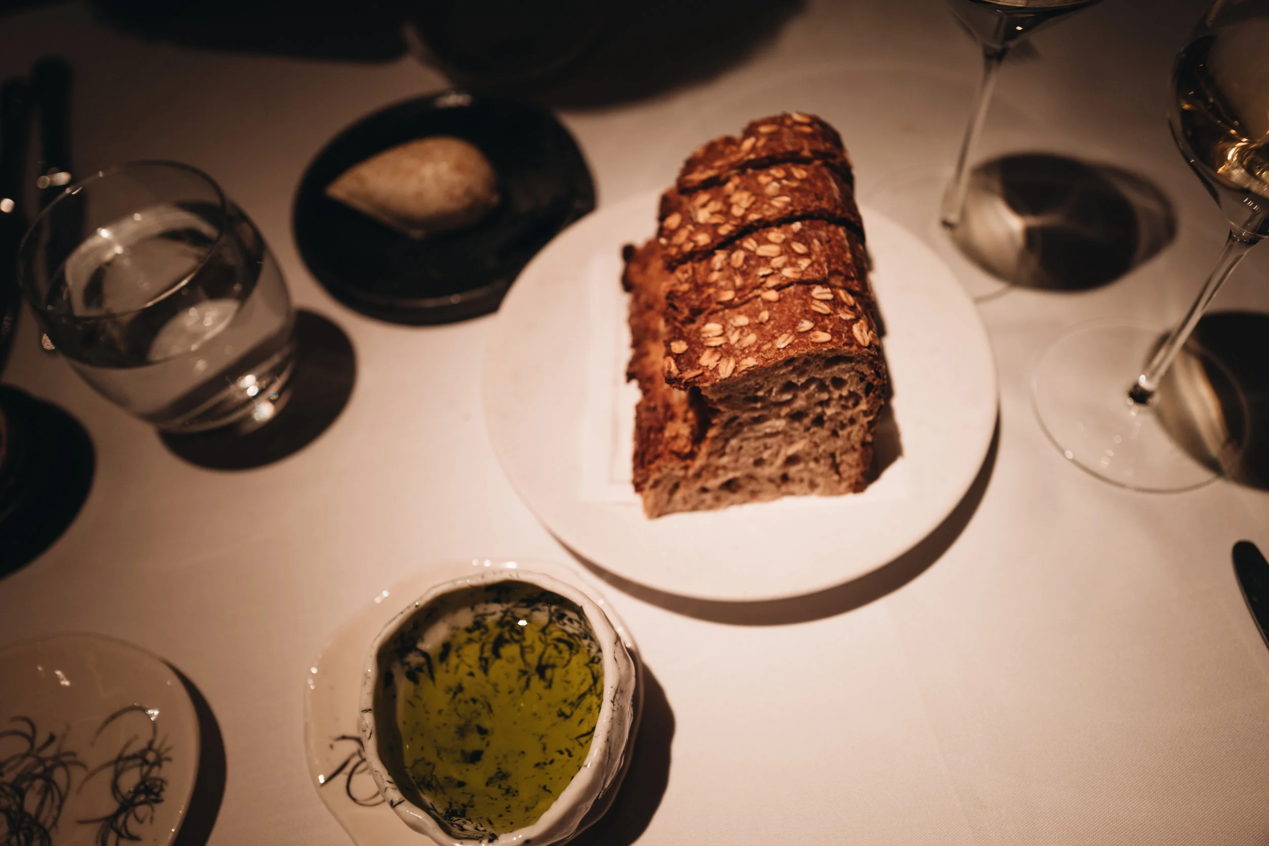 Toasted bread with Goat Butter (vegetarian) or Olive Oil (vegan). 烤麵包 配 羊奶黃油(奶素)或橄欖油(純素)