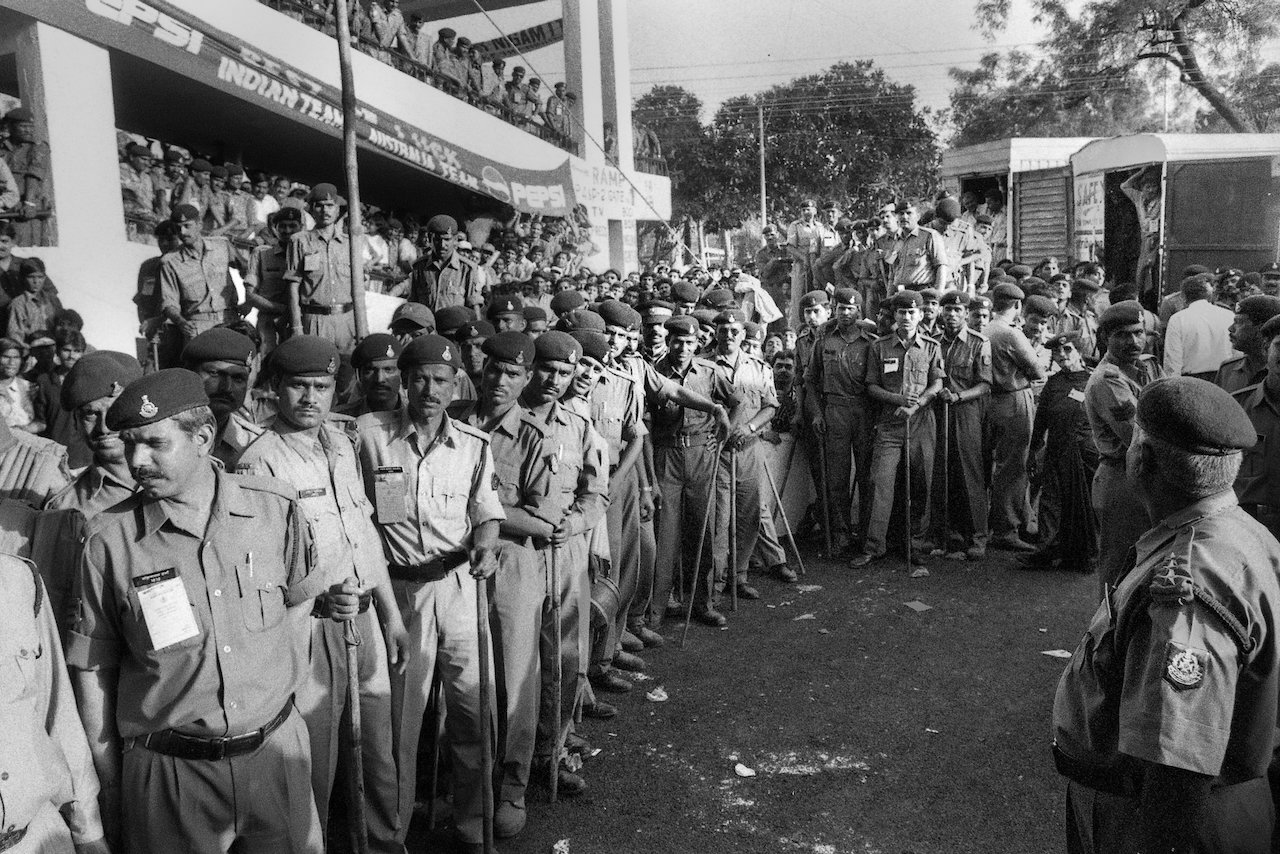 Police outside the players' dressing rooms, Indore, 2001