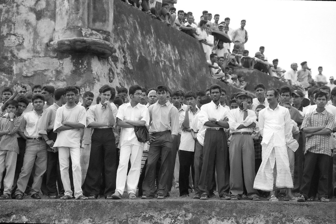 Crowd watching a one-day international from Galle Fort, August 1999