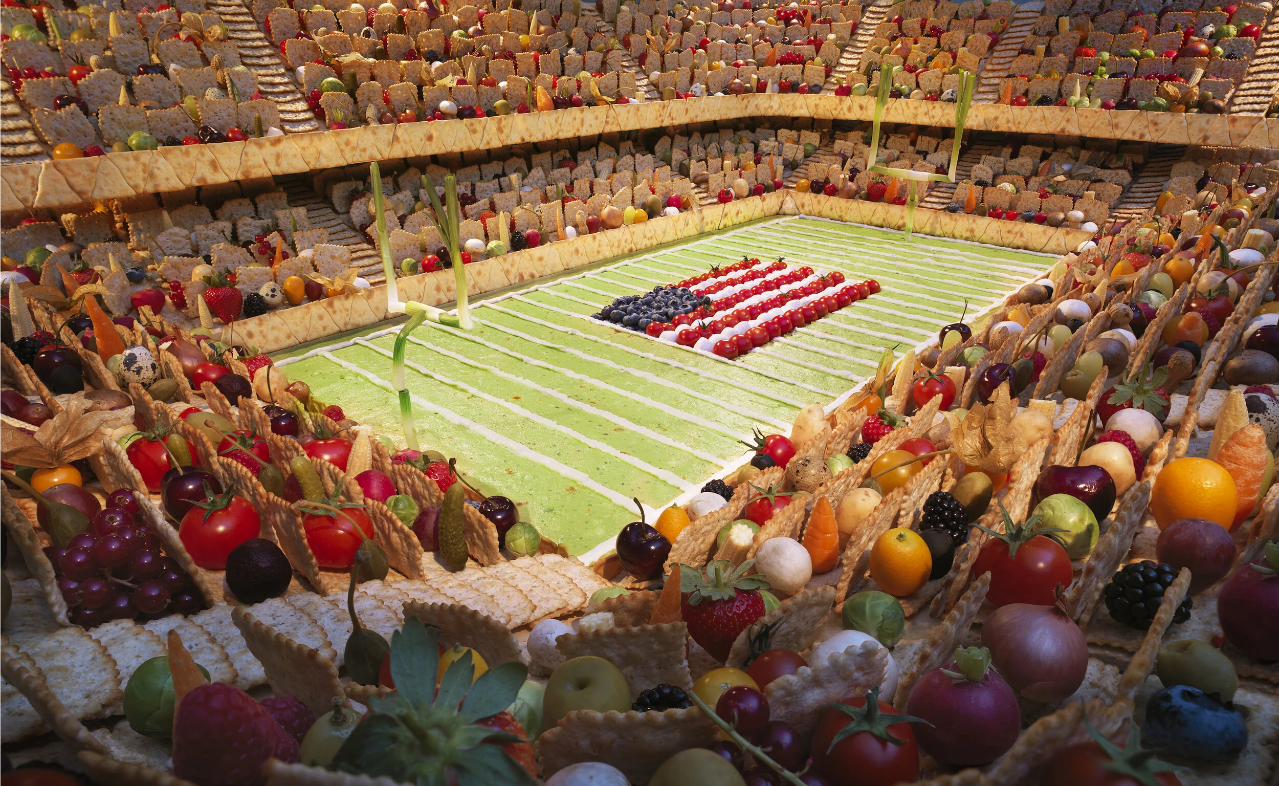  Each 4’x6’ scene was hand crafted and photographed in partnership with  Carl Warner . 