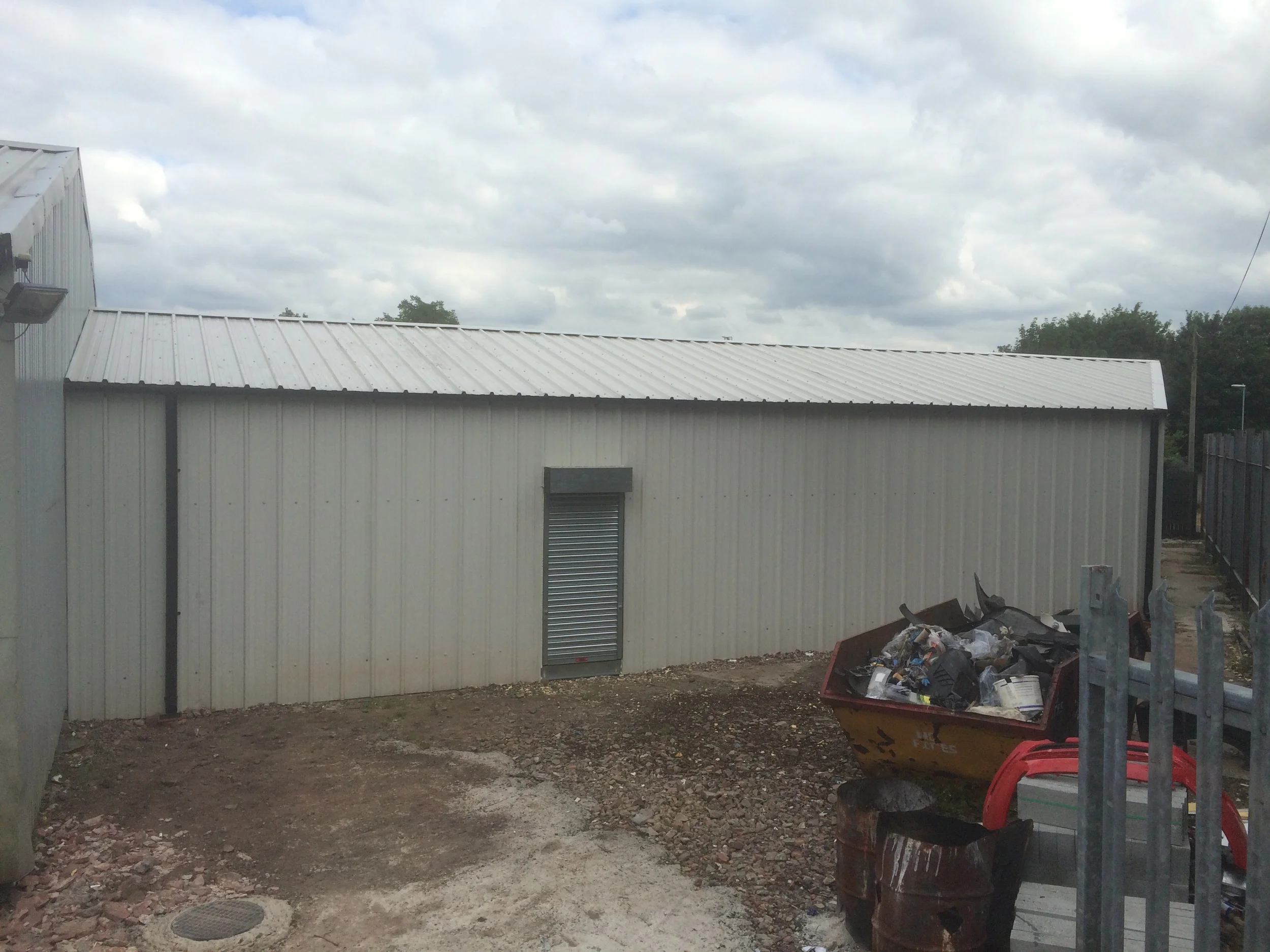 Unequal length industrial building complete.