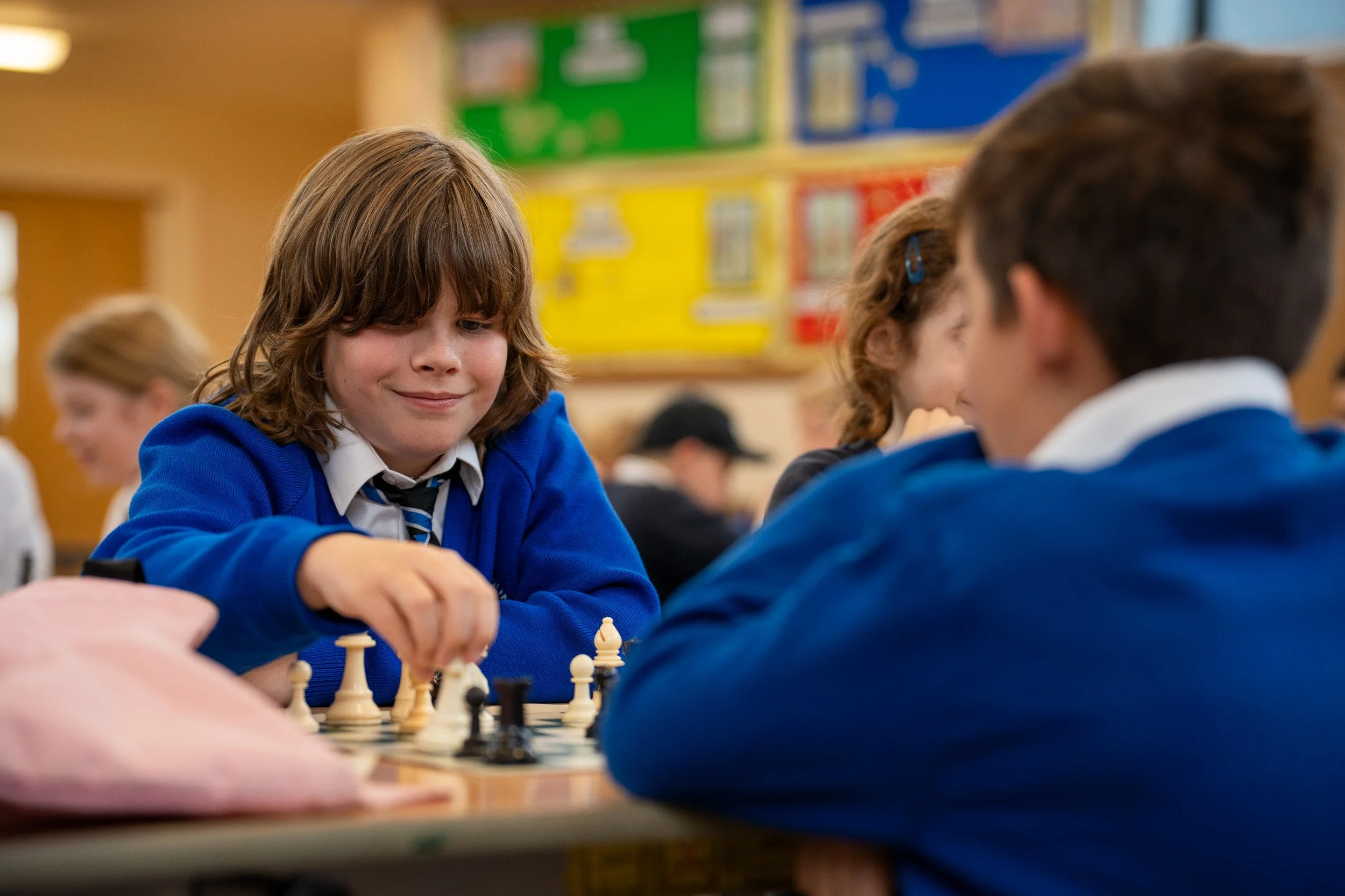 Children playing chess at Ladymount Catholic Primary chess club