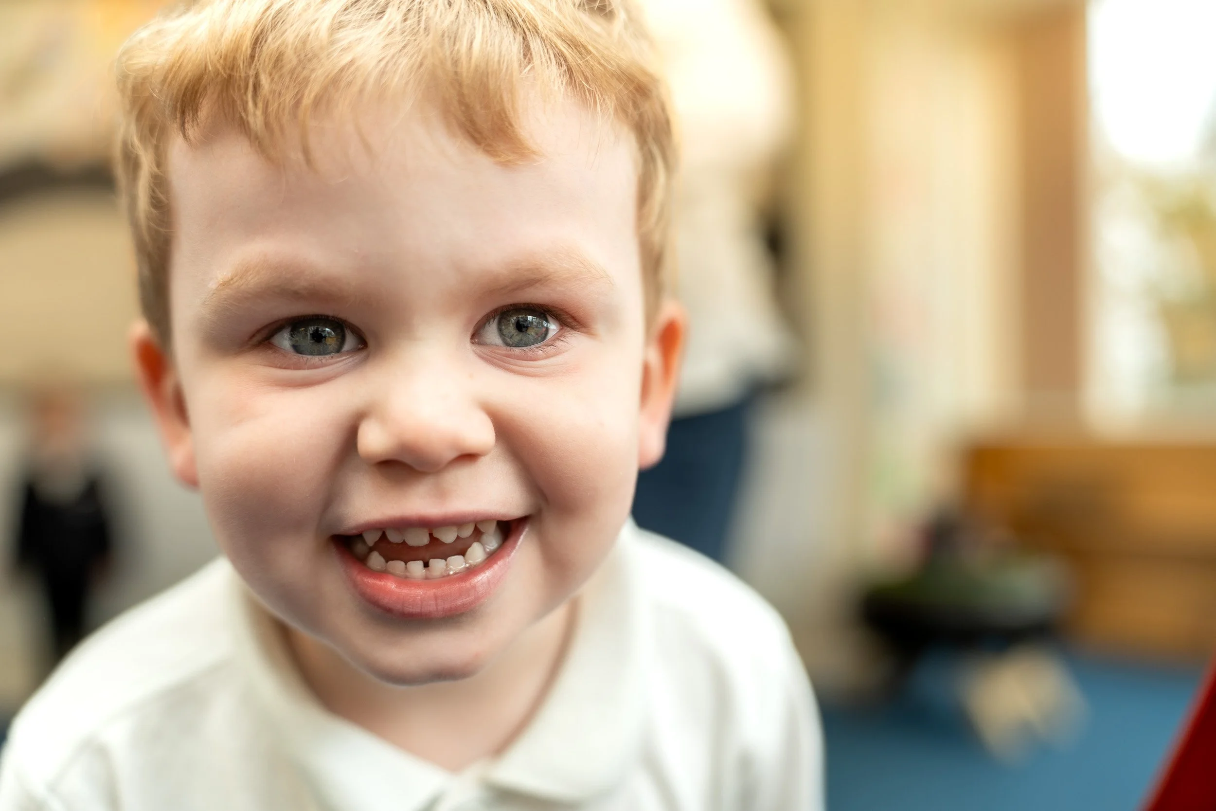 A happy, smiling boy attending Ladymount Catholic Primary School Early Years Classes
