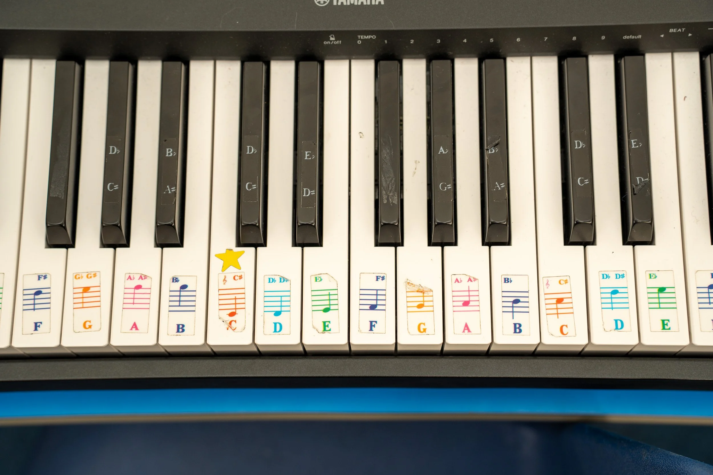 Keyboard sith cute illustrations on the keys to aid playing