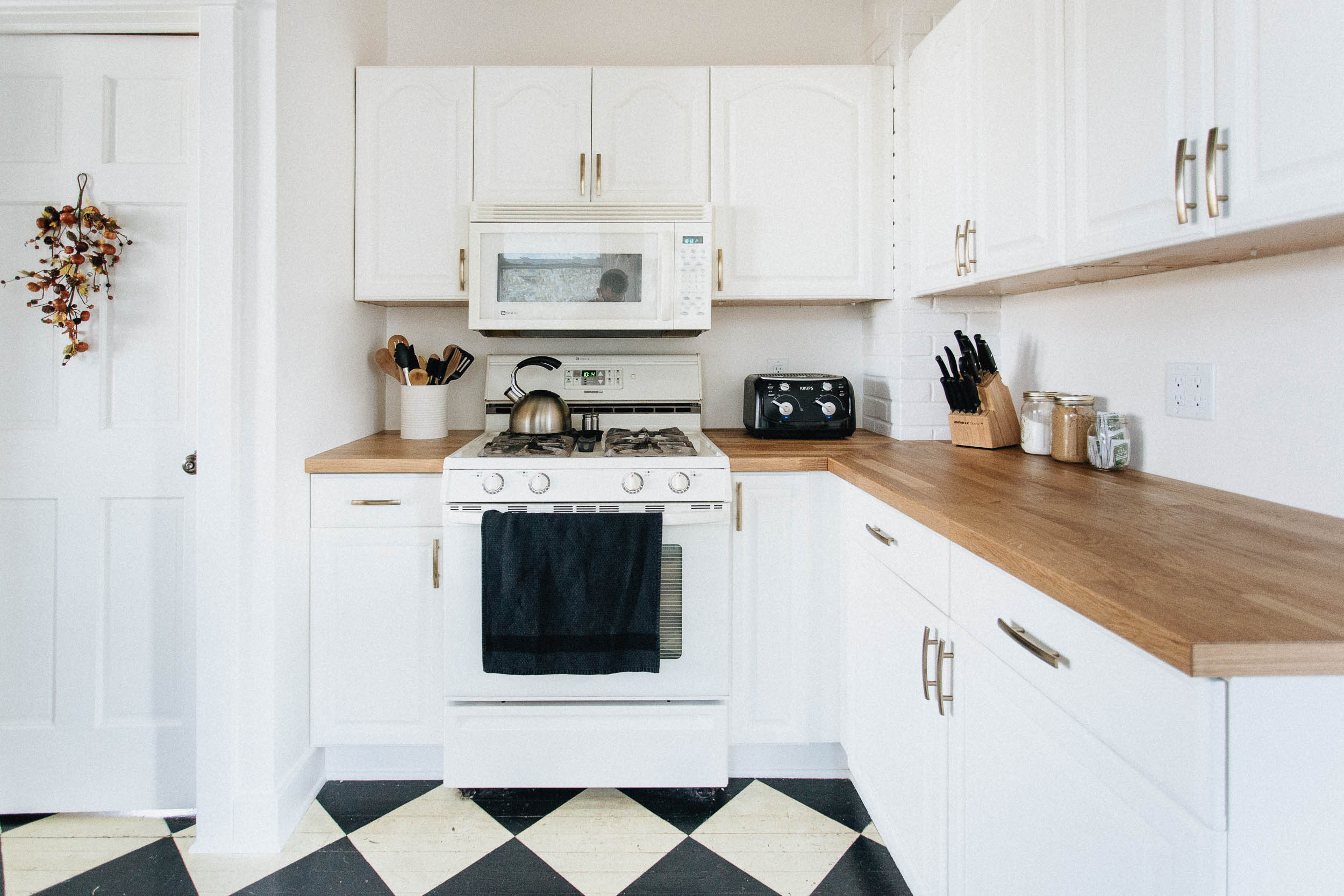 Bright White Kitchen with Butcher Block Counters