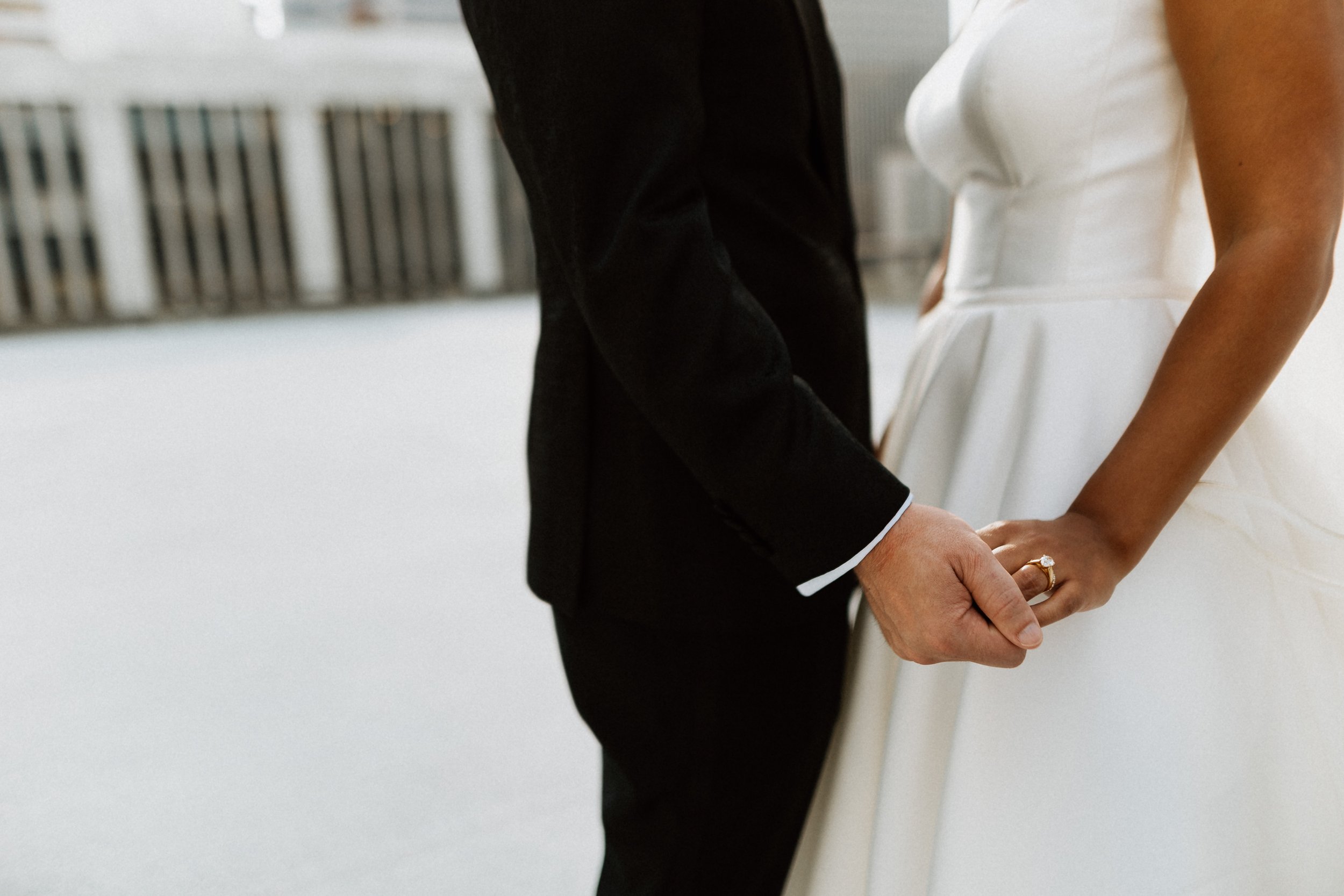 Bride and Groom holding hands