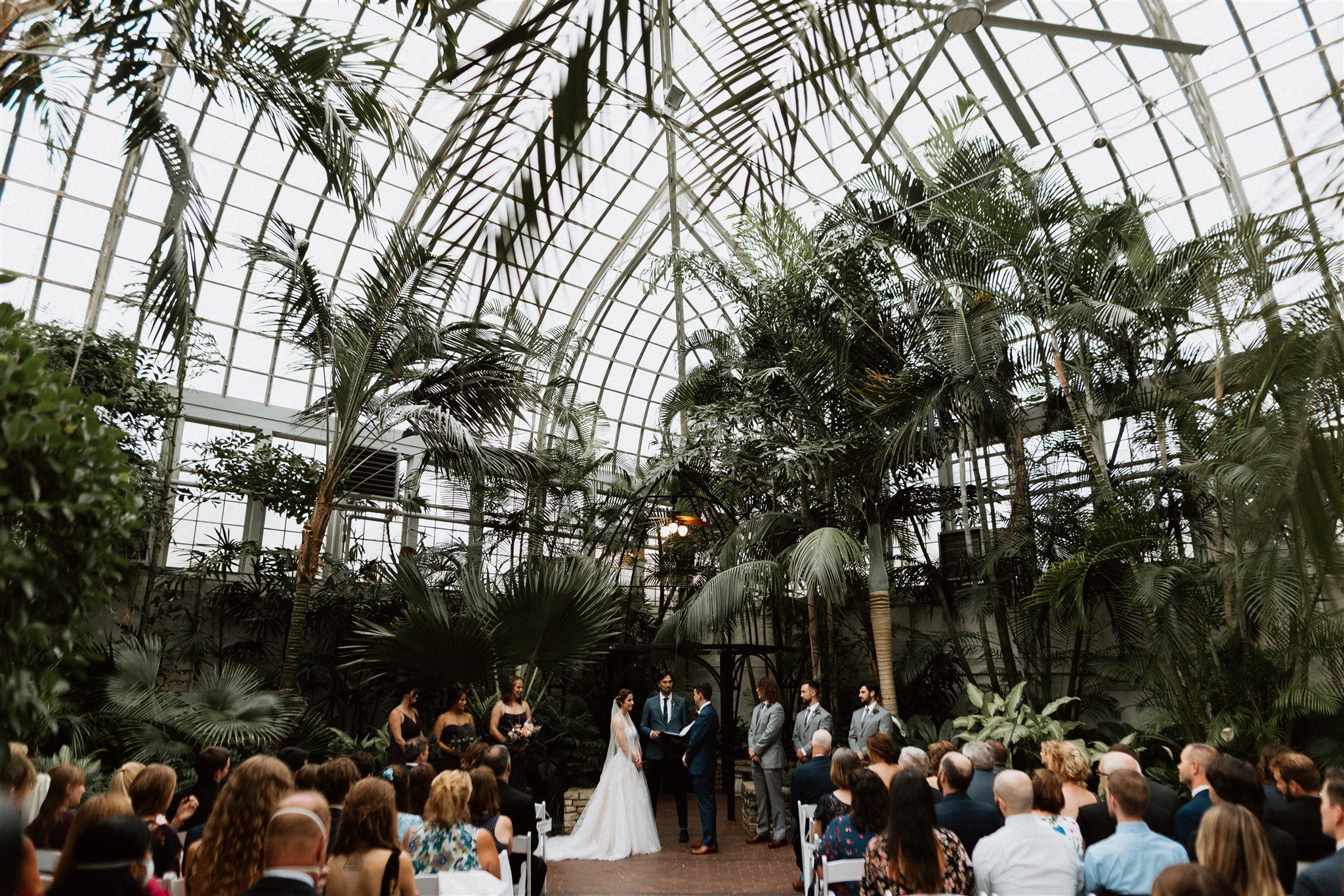 Greenhouse wedding with palm trees at Franklin park conservatory 