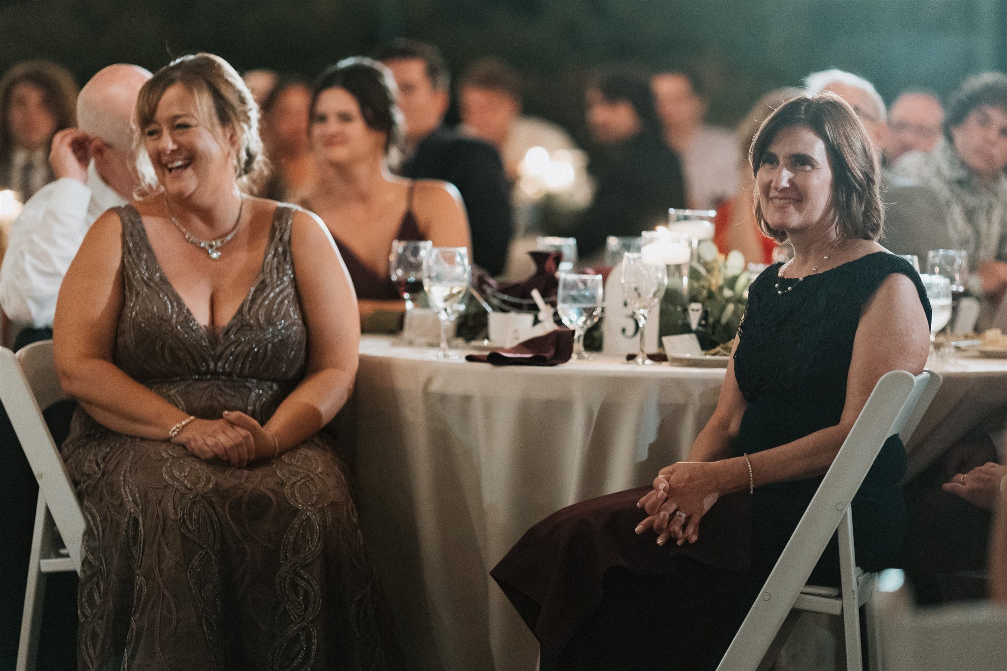 mother of the bride and mother of the groom candid