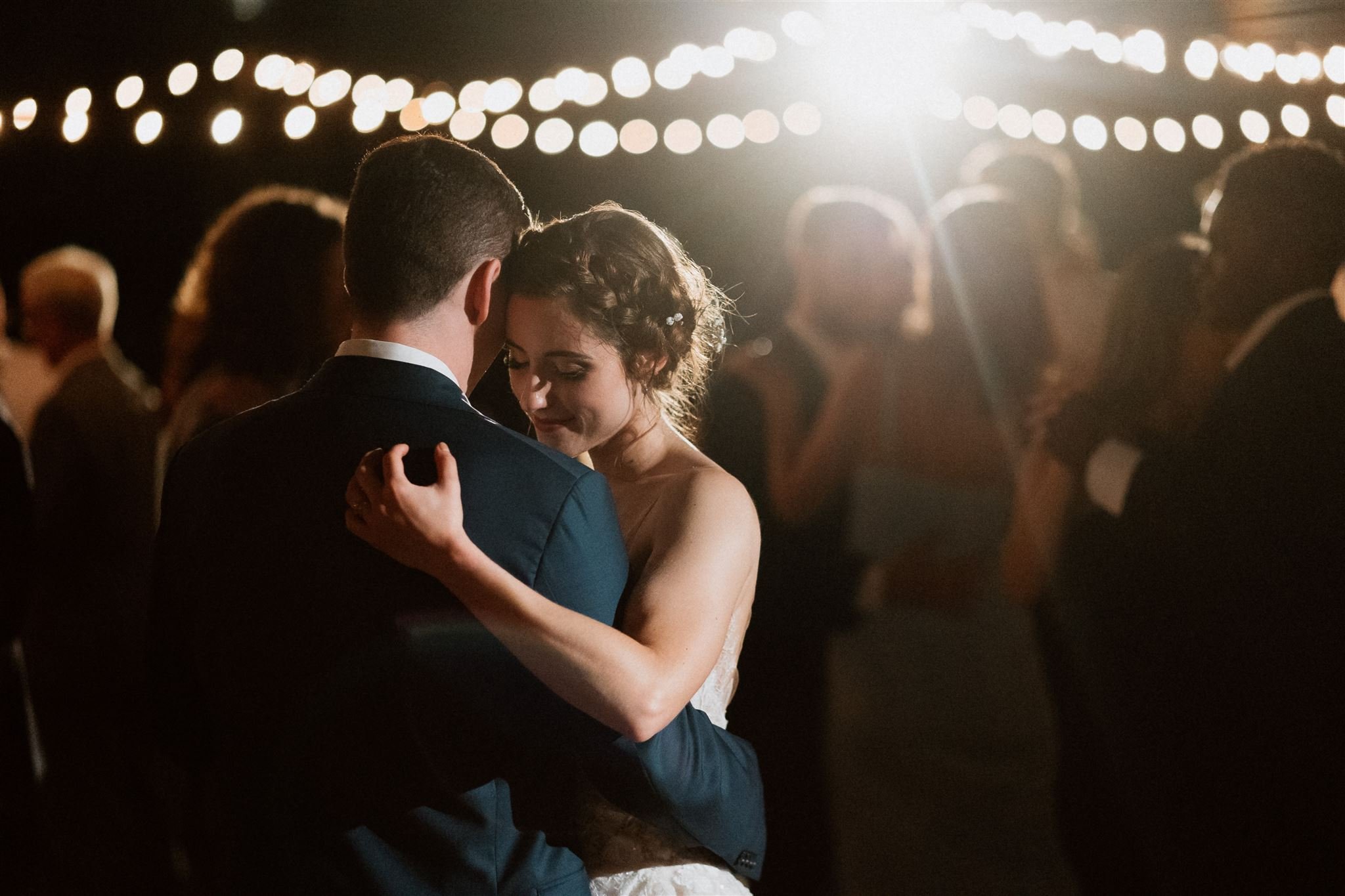 bride and groom and a moment in the crowd 