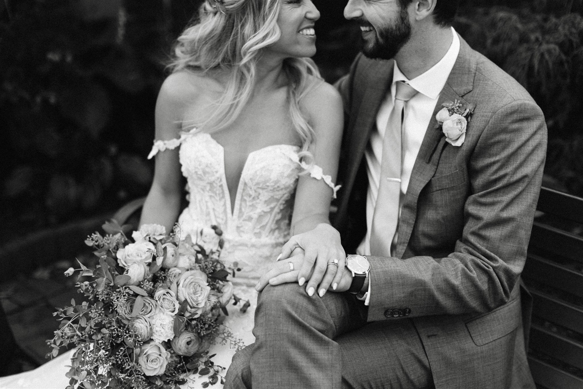 bride and groom sitting