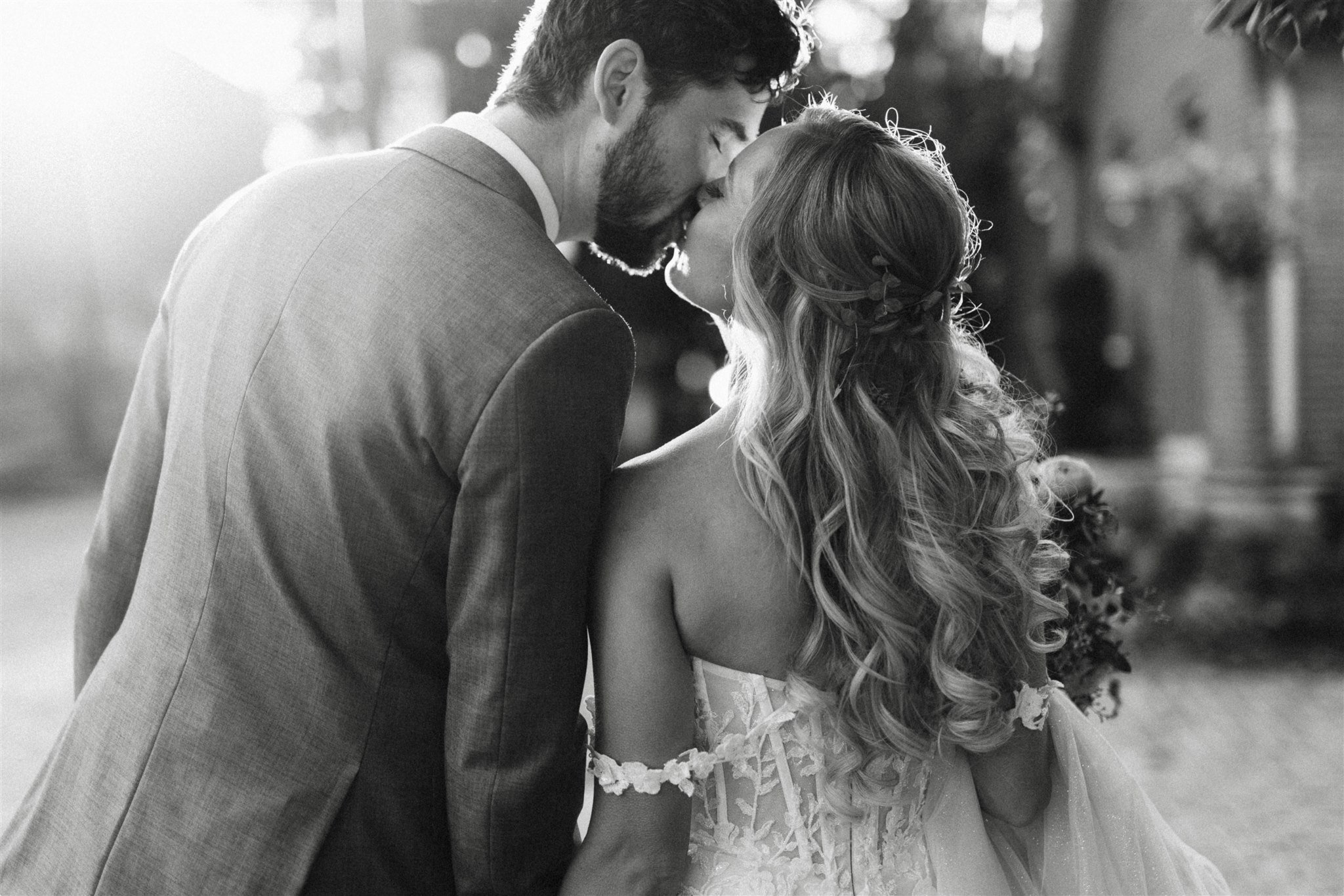 bride and groom kissing in German village