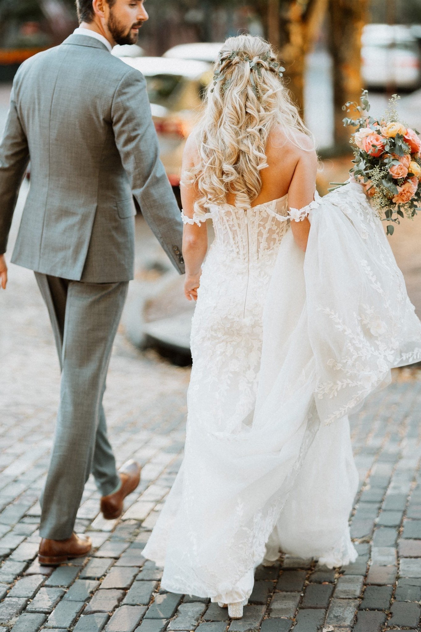 bride and groom walking in German village