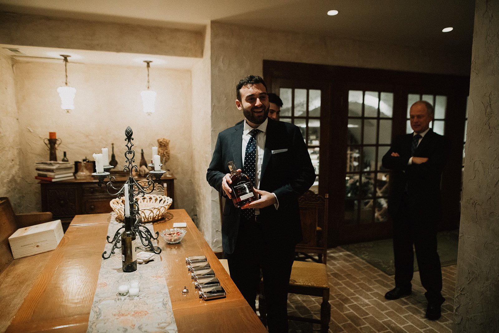 Groom getting ready with gift