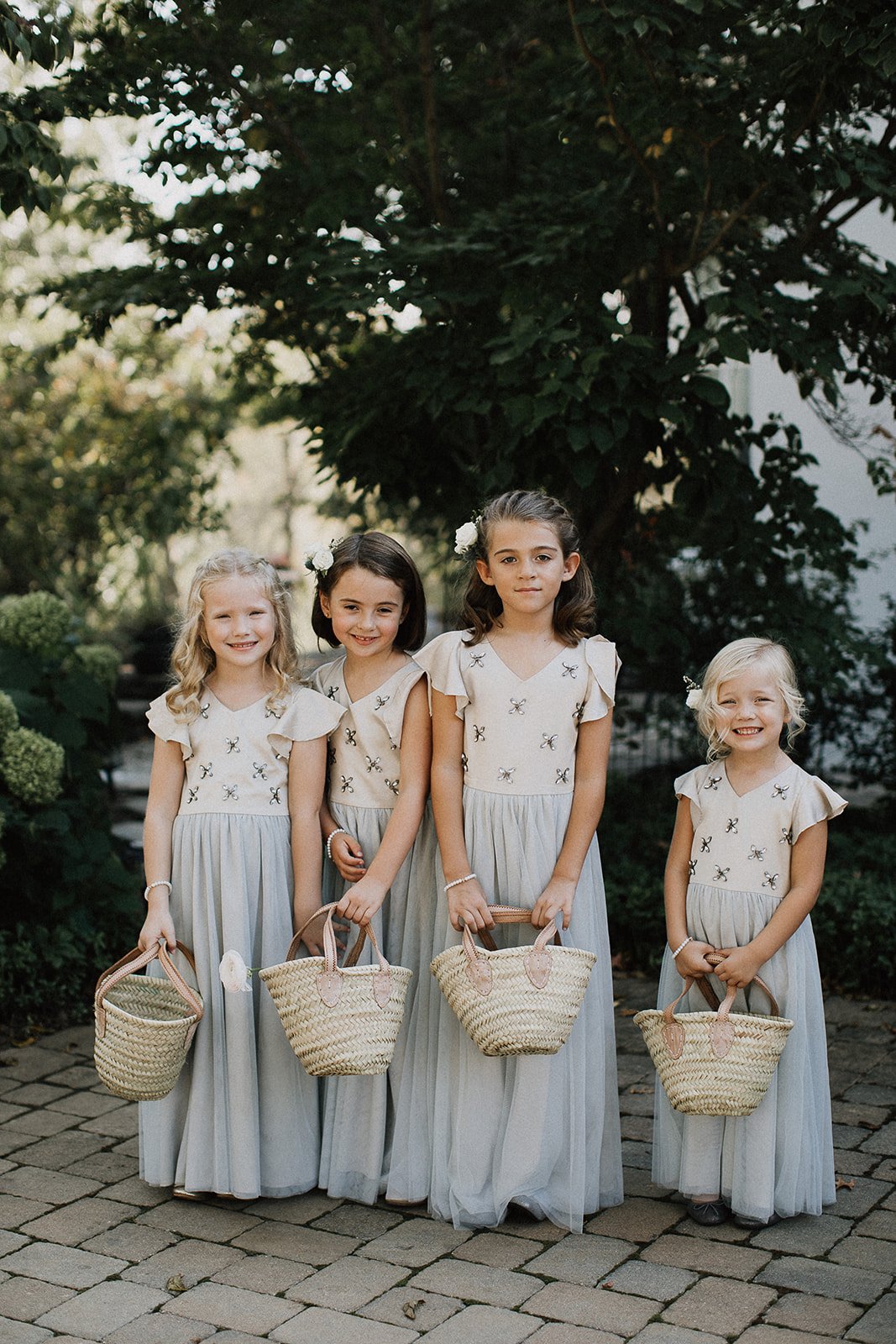 flower girl portrait with baskets