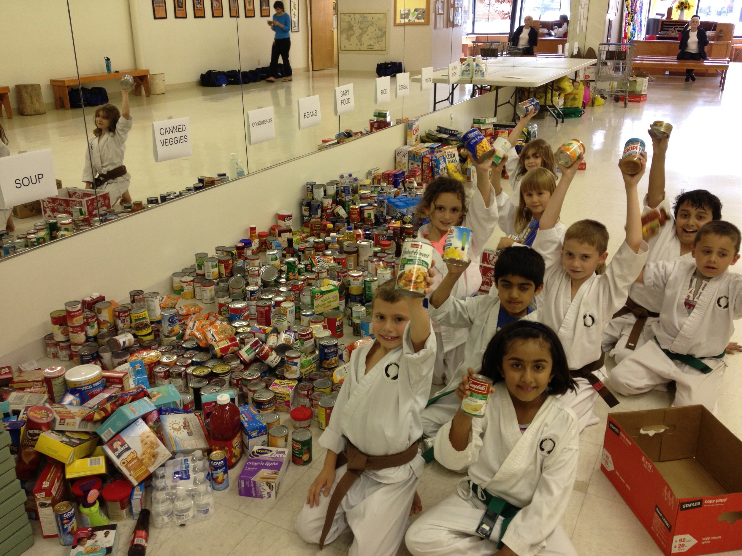 thedojo-food-drive-martial-arts-karate-kids-doing-community-service-in-rutherford-nj_14648179956_o.jpg