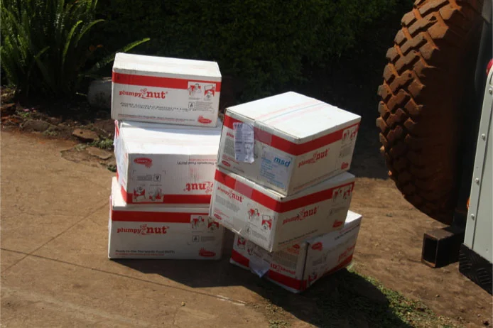 picking boxes up in Monduli