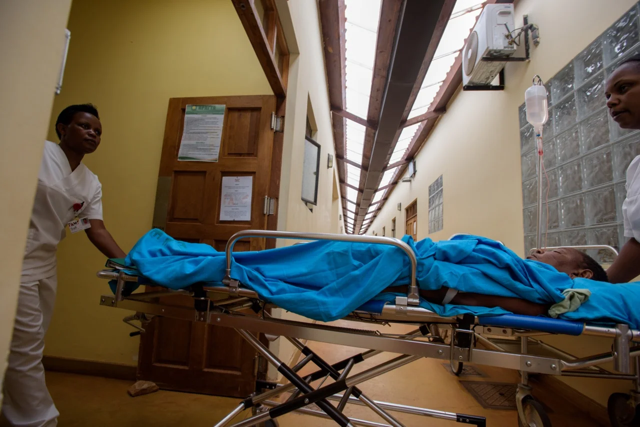 Nurses taking Riziki to the OR, photo by Moon Lai