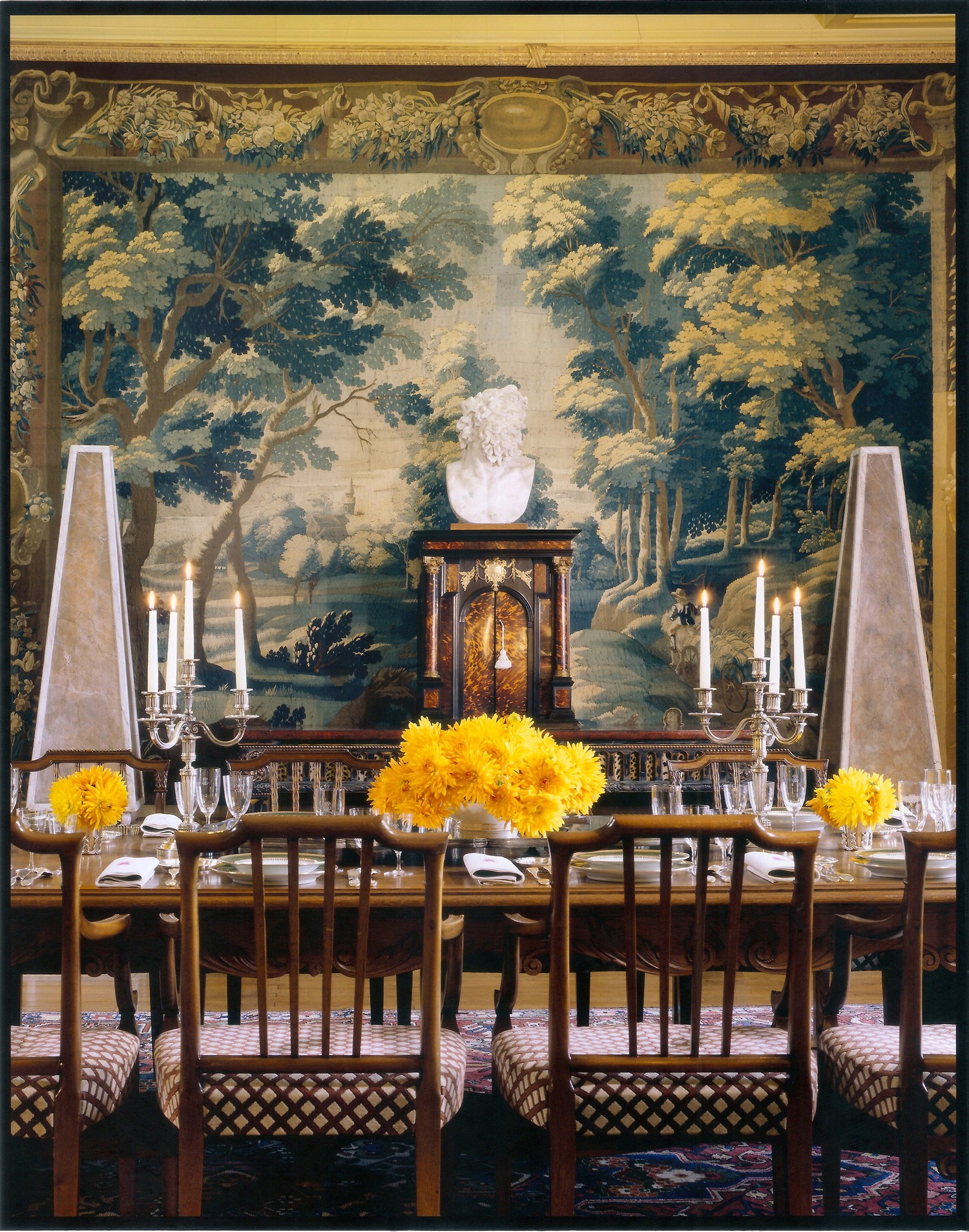   “In this dining room in France, I hung a 17th-century tapestry as a focal point. I love the depth and texture a tapestry brings to a room. I favor old ones for their faded colors and textures, but there are many beautiful modern tapestries as well, and they are often affordable.” Photo: Marina Faust  