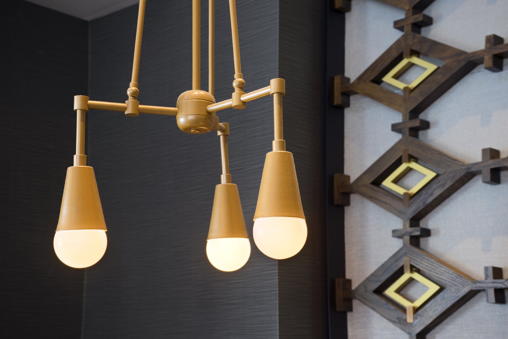 Custom designer chandelier by Spike Lighting at Stella San Jac Restaurant in Austin, TX.  Product Photography by Leslie Parrott