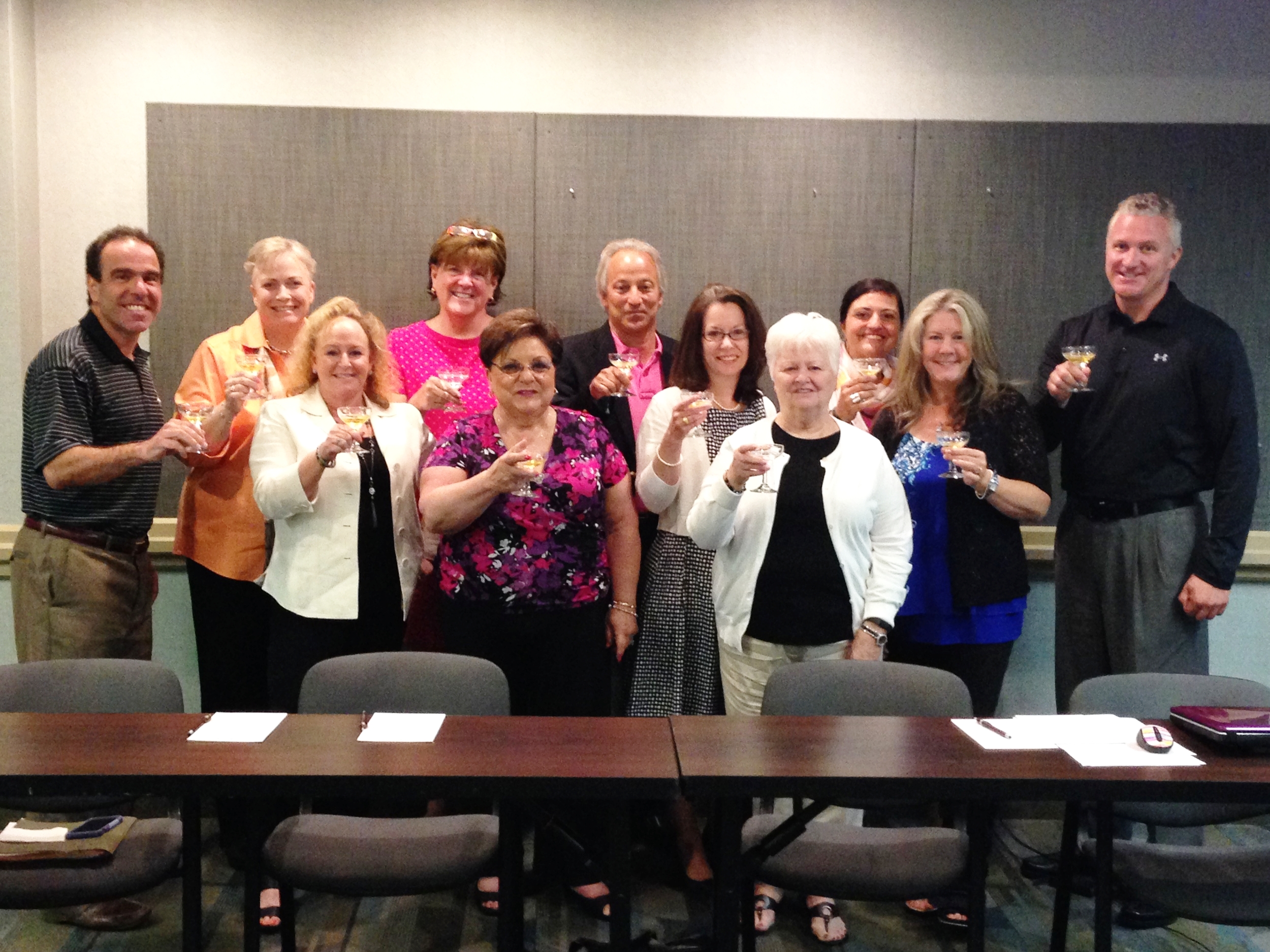 Board of Directors toasting a successful 2016 Cherrybration season. Pictured Pete Mangione, Sherri Collins-Witzke, Beth Ditman, Mimi O'Donnell, Tina Broccolino, Joe Barbera, Christie Lassen, Janet Robey, Anita Broccolino, Michelle Wildman, Ross Hecox. Not pictured: Regina Ford, Sean Harbaugh, Wayne Johnson, Becky Mangus.