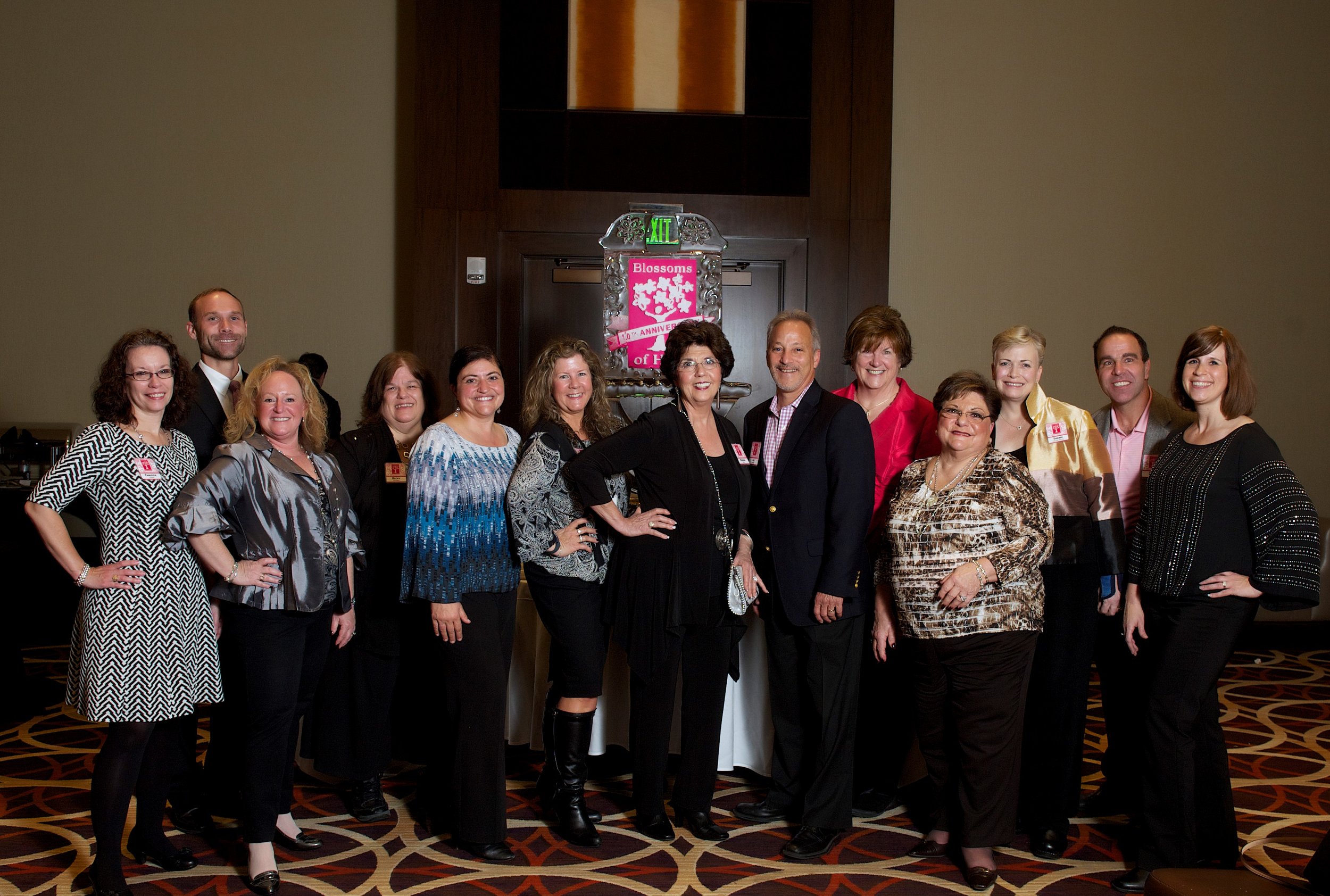 The Blossoms of Hope Board of Directors at the Diamond Casino Night in November 2015: Christie Lassen, Sean Harbaugh, Beth Ditman, Becky Mangus, Anita Broccolino, Michelle Wildman, Regina Ford, Joe Barbera, Mimi O'Donnell, Tina Broccolino, Sherri Collins-Witzke, Pete Mangione, and Blossoms of Hope Administrative Coordinator, Lene McCollum. Not in photo: Wayne Johnson and Janet Robey Photo courtesy of Pam Long Photography