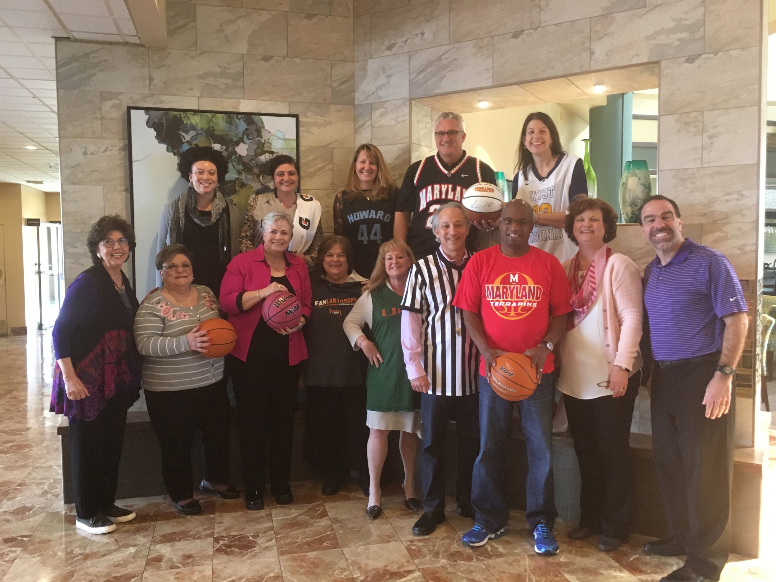 Blossoms of Hope Board getting ready to Tip-off Brackets for Good! Pictured: Top (left to right) MySha Allen, Anita Broccolino, Vera Simmons, Ross Hecox. Bottom (left to right) Regina Ford, Tina Broccolino, Sherri Collins-Witzke, Becky Mangus, Beth Ditman, Joe Barbera, Rocky Brown, Suzi Padgett, Pete Mangione.
