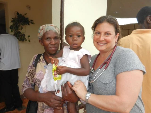 Susan with kid and mom.jpg