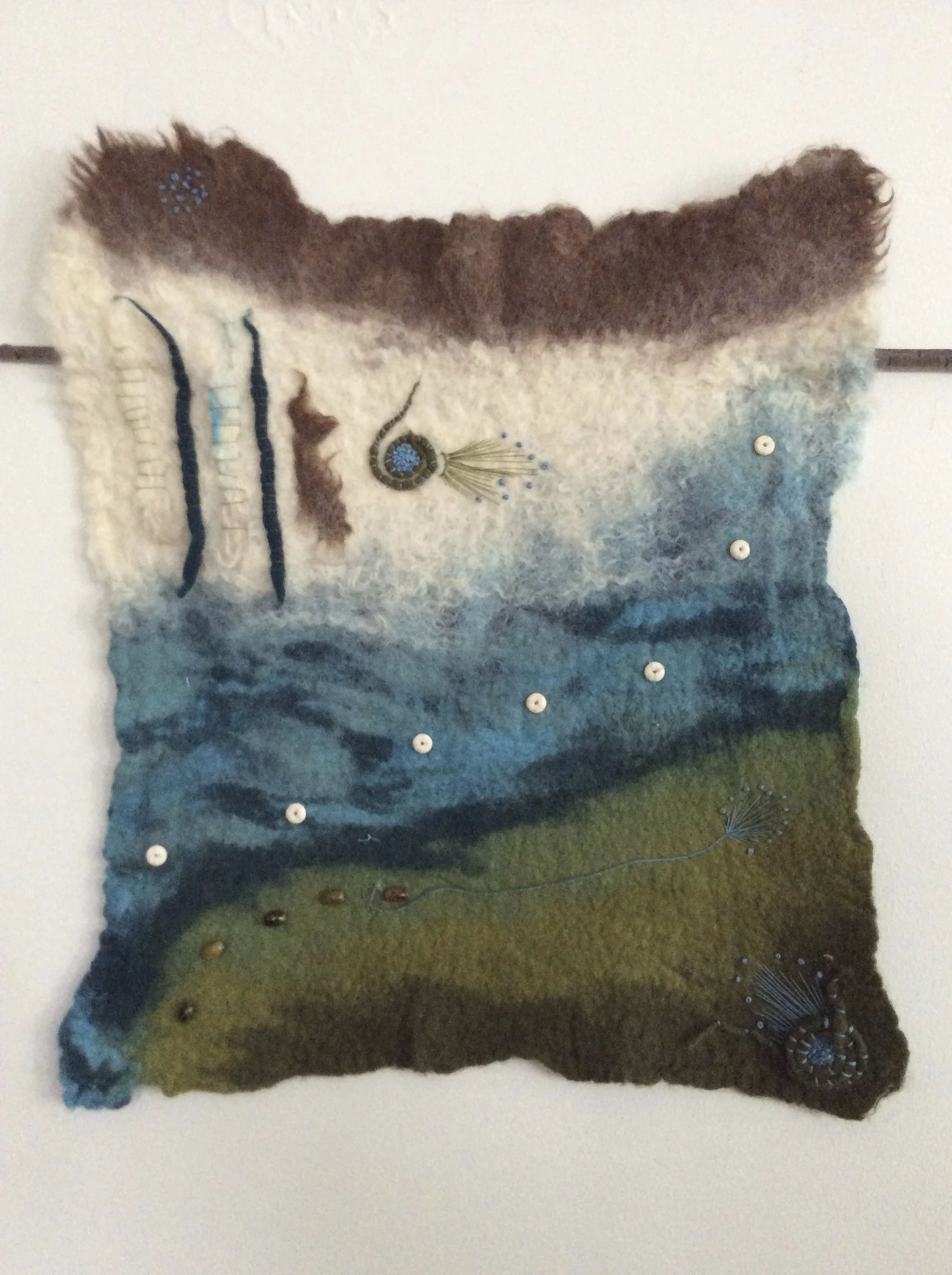 Wall tapestry. Size, colors. shape, embellishments, cost vary.