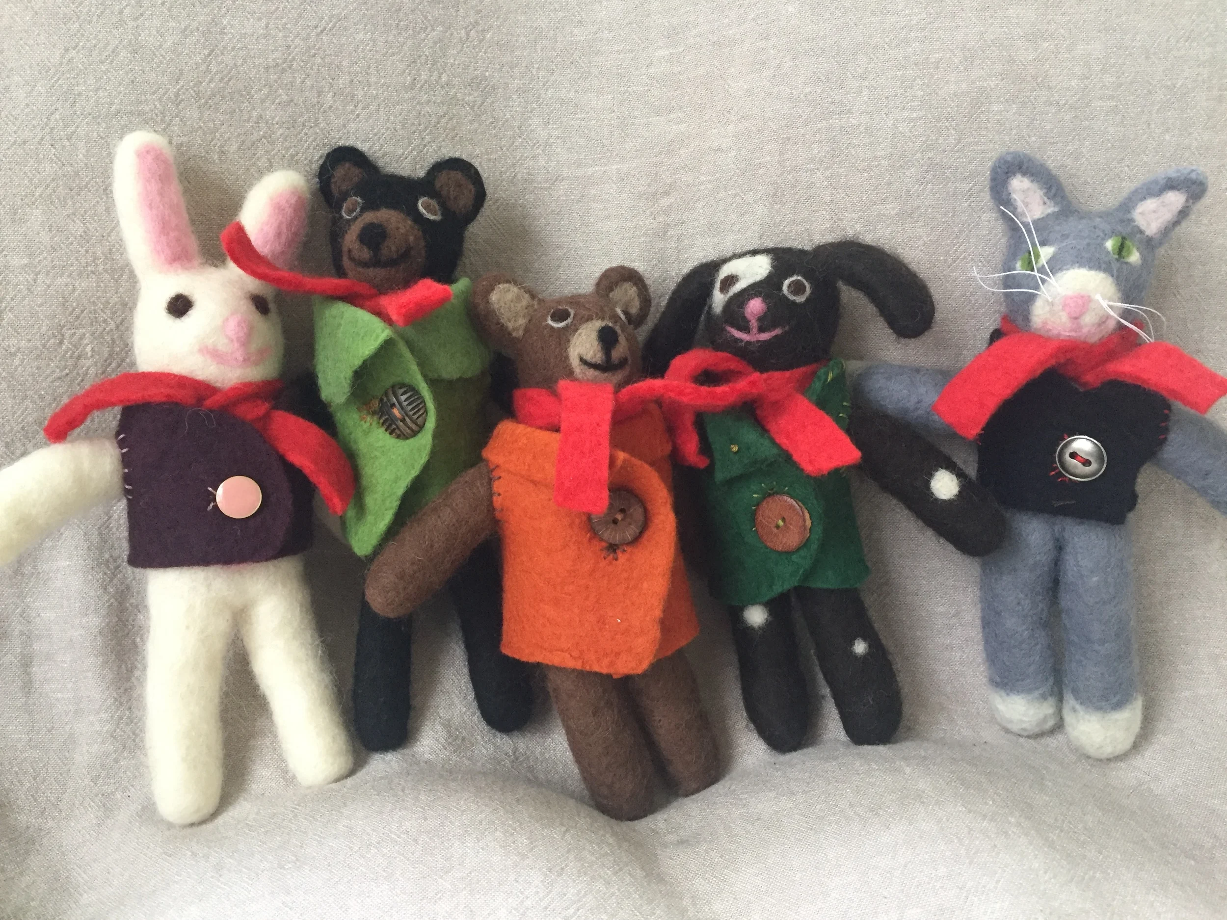 Wet felted, sturdy little friends. About 8 inches tall. May be made with or without jackets.