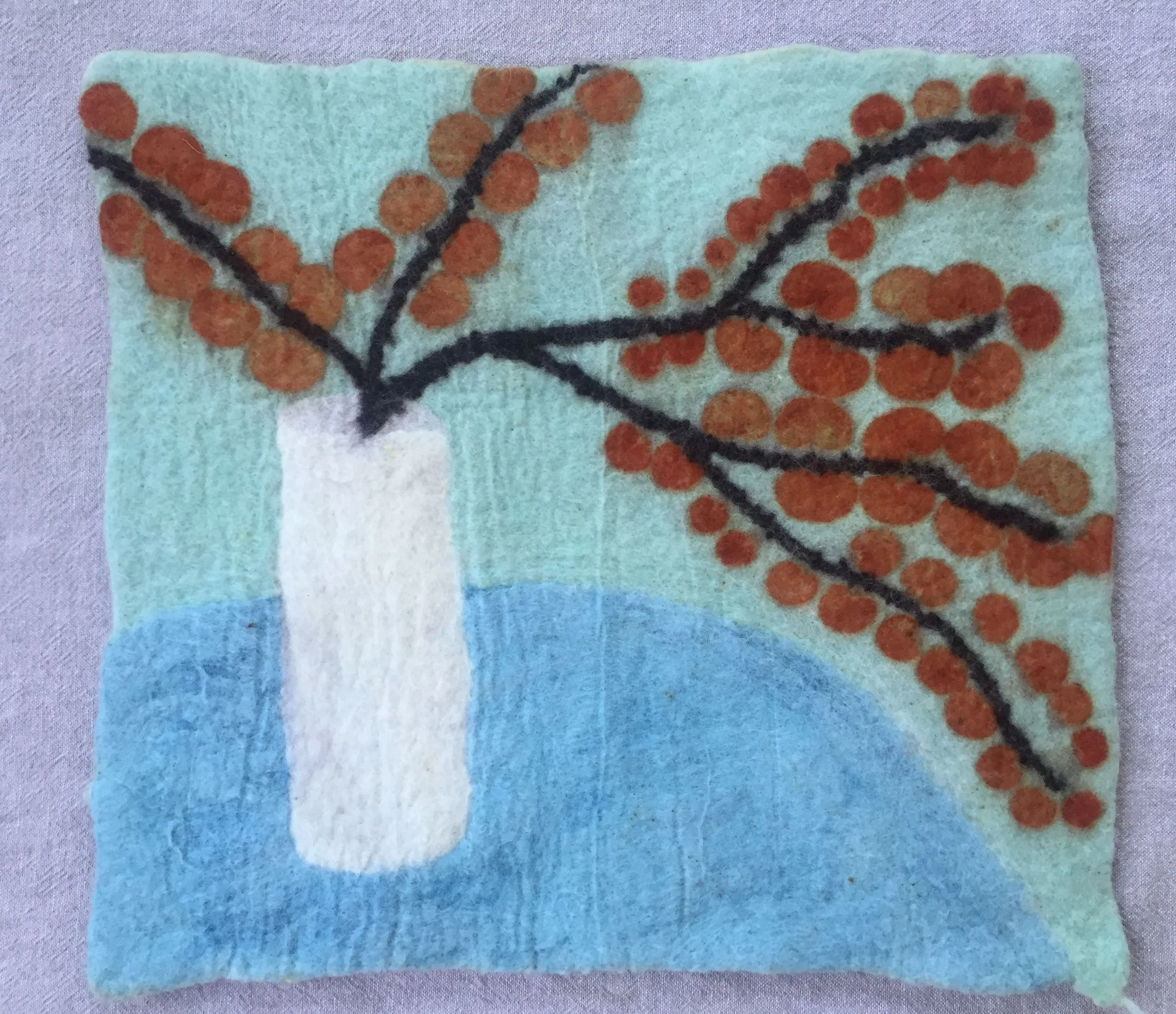 Wet felted wall hanging, eco printed with eucalyptus.