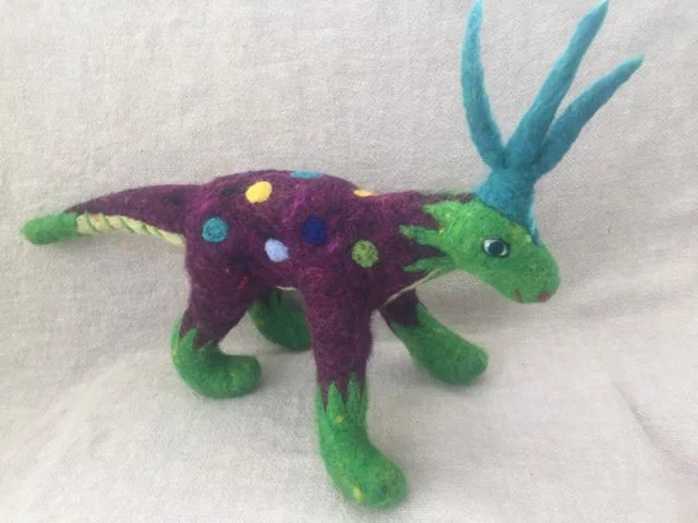 Dinosaur, dragon, both?