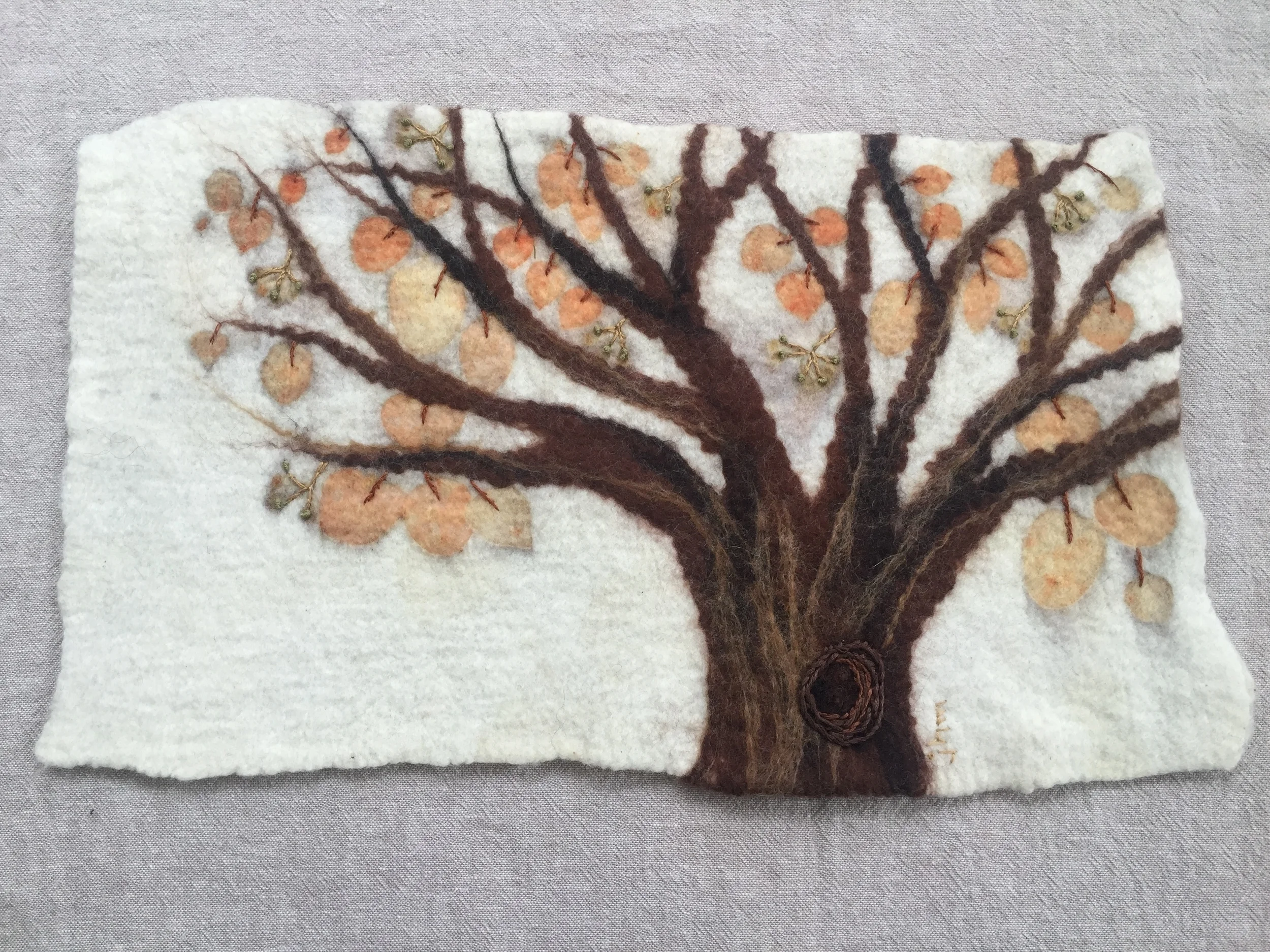 Wet felted, then eco printed with eucalyptus.