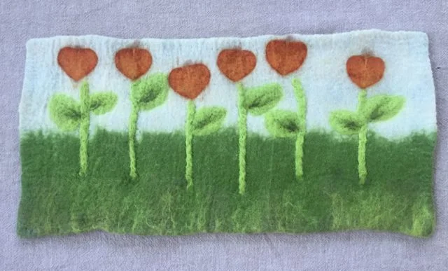 Wet felted, eco printed wall hanging.