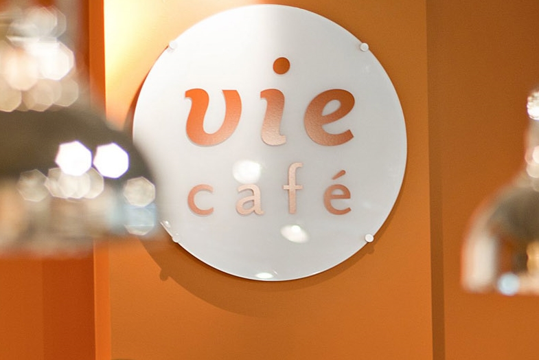 Vie café interior sign