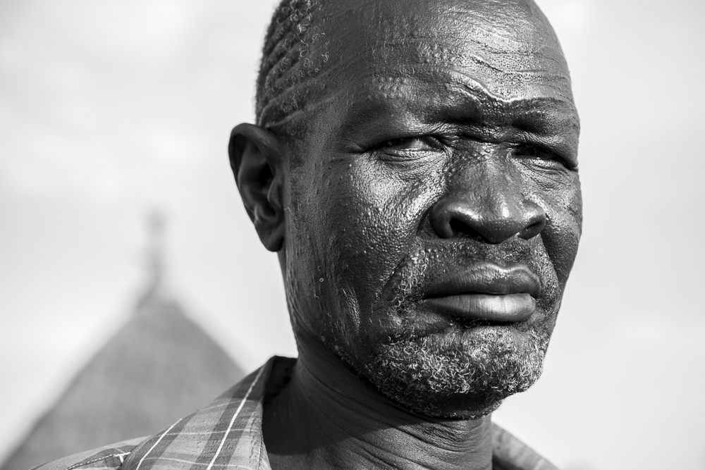 Nuer warrior with deep facial scarring