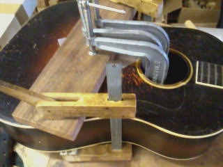 Gluing the new bridge plate in
