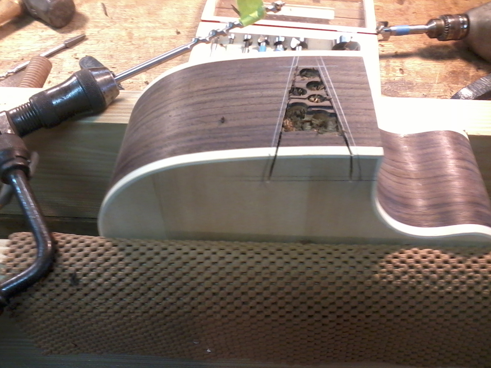 After layout I used a back saw then a brace and #5 auger