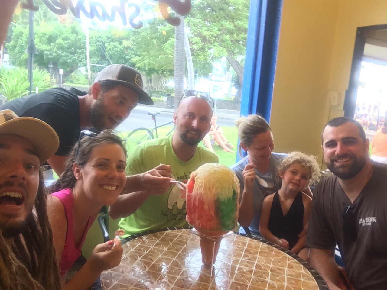 Seven Alaskans enjoying a winter in Hawai'i and sharing a Hawaiian delicacy...Shave Ice!
