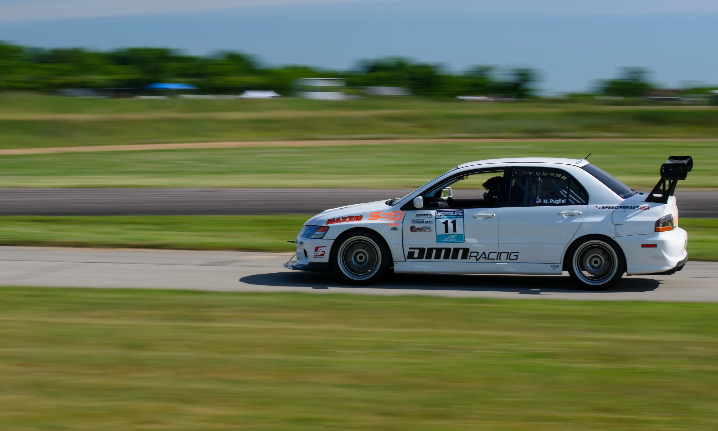 DMN Racing's Evo piloted by Michael, took Second in Trackt Modified overall with a blazing time of 1:38.420. 