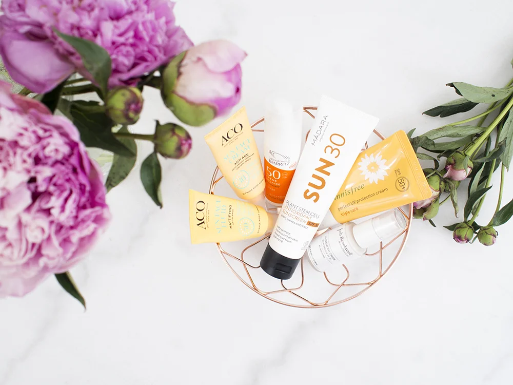 Best Sunscreens of 2018 | flatlay | Laura Loukola