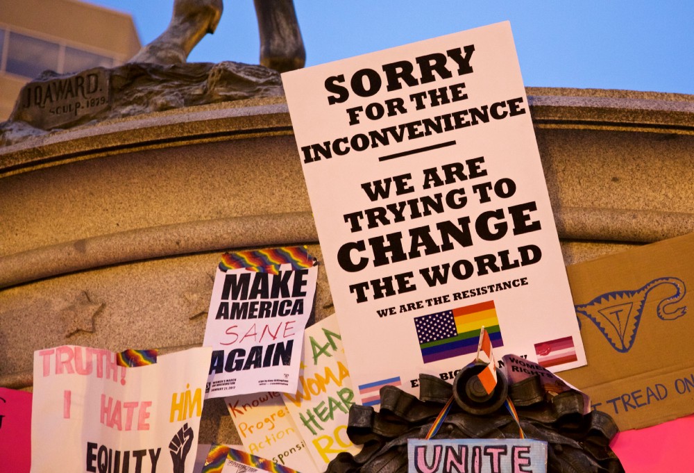 Posters left around Dupont Circle after the D.C. Women’s March. Photo by author.