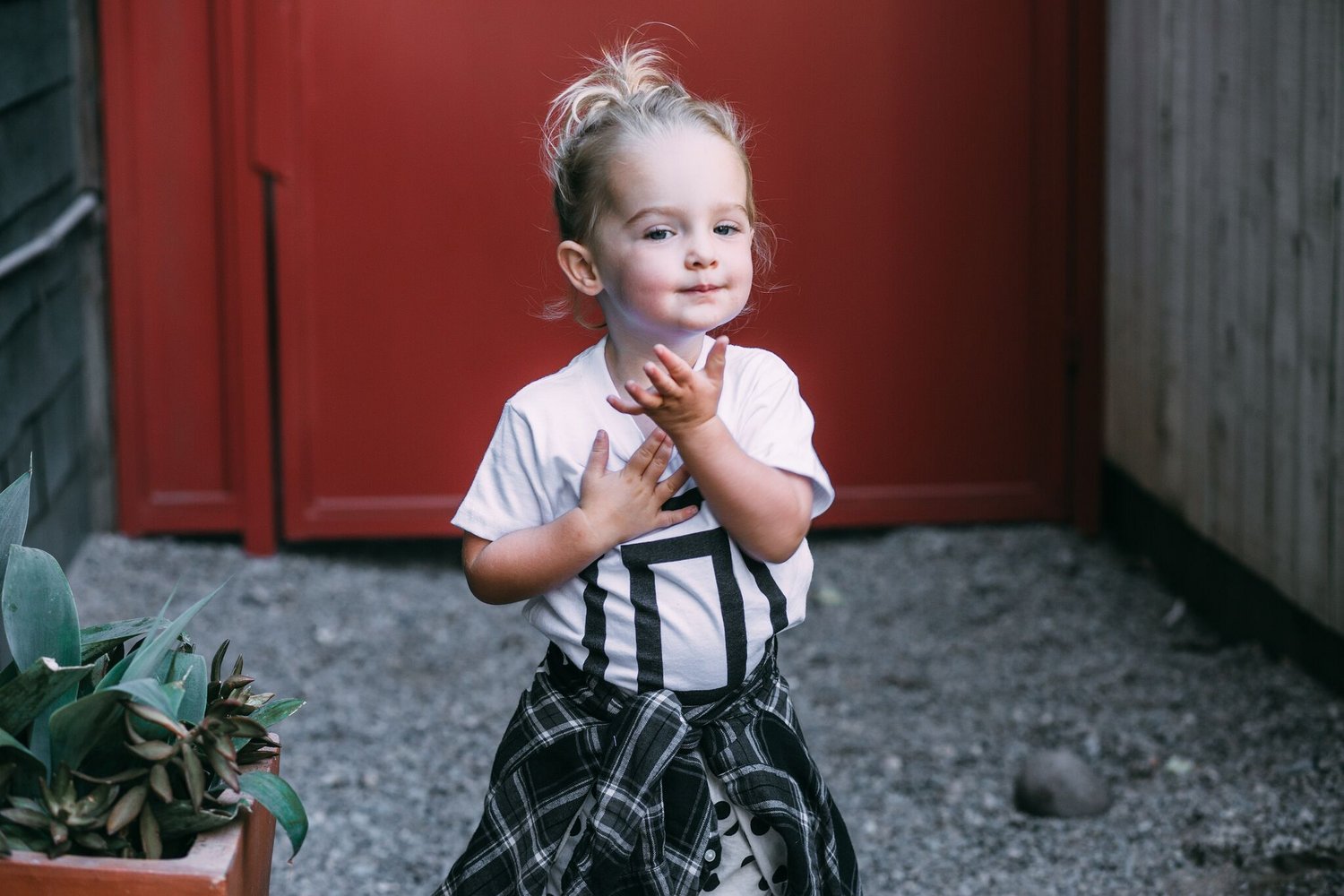 toddler baby girl street style wih polka dot suspenders and graphic tee