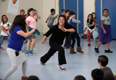 Saki performing with students - Photo by Vern Fisher.jpg