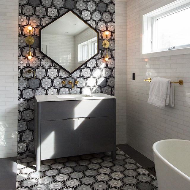 Loving how @strianesepew incorporated our Hex Mirror into this beautiful bathroom! 📷@meredithheuerphotog