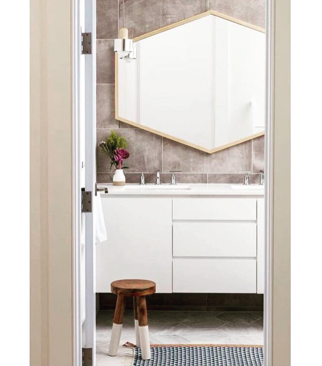 Swooning over this bathroom by Dale &amp; Andrea Design. Custom elongated version of our Hex mirror in natural ash with silver leaf detail. Love the @alliedmaker pendant too! Architect: @ana_vazquezc 📸@kyle_j_caldwell