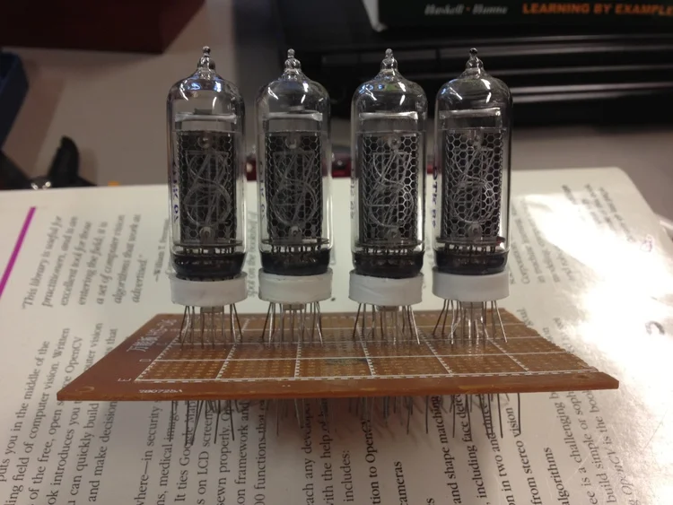 All four Nixie tubes & RGB LEDs soldered down.