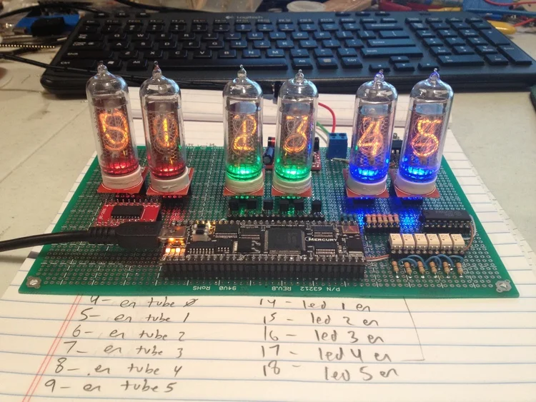 Ghosting of the previous digit! This problem was eliminated by added dead-time to the Nixie tube multiplexing circuit.